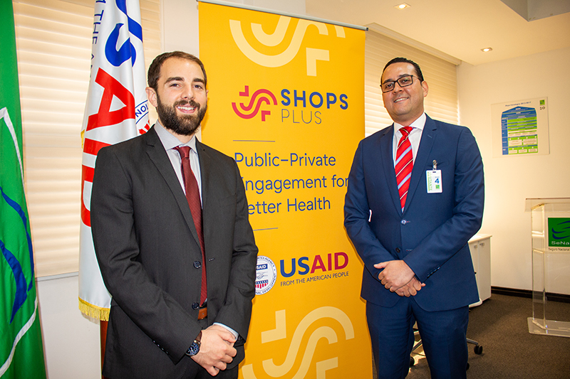 SHOPS Plus staff members Jonathan Cali and Nassim Díaz Casado posing for a photo at the event